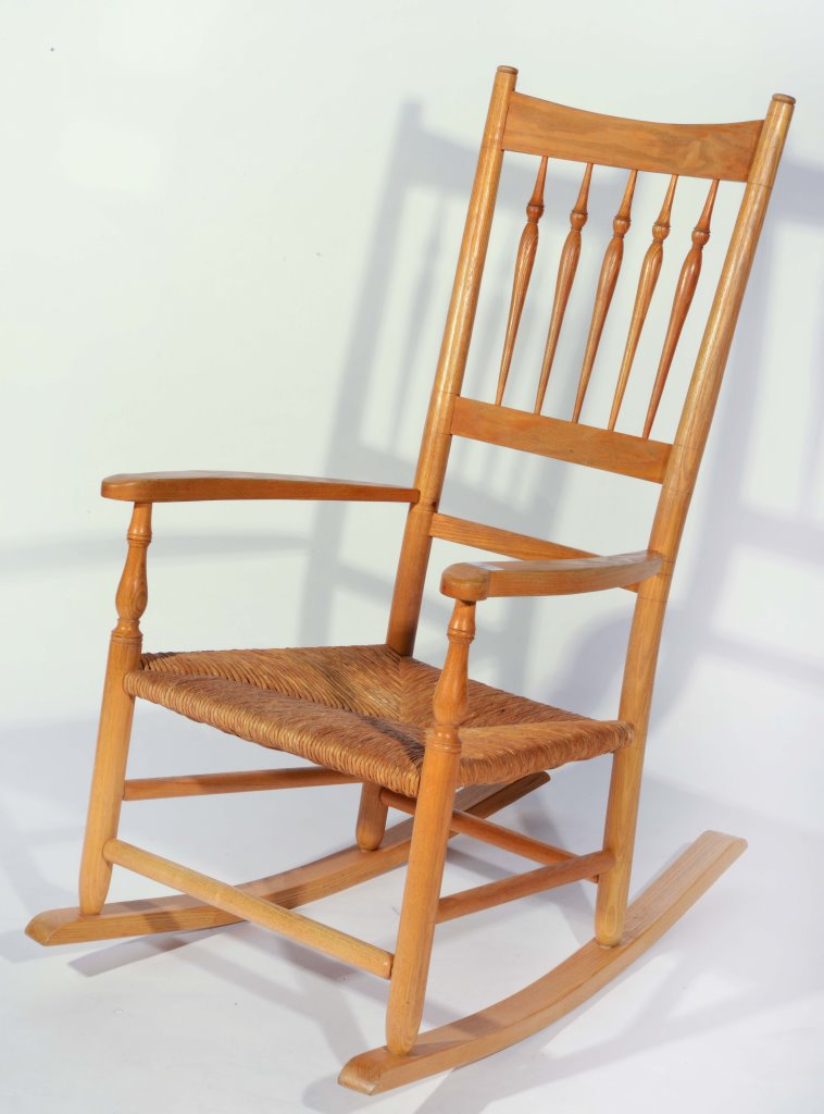 Lot 20 - A COTSWOLD STYLE RUSH SEATED ROCKING CHAIR