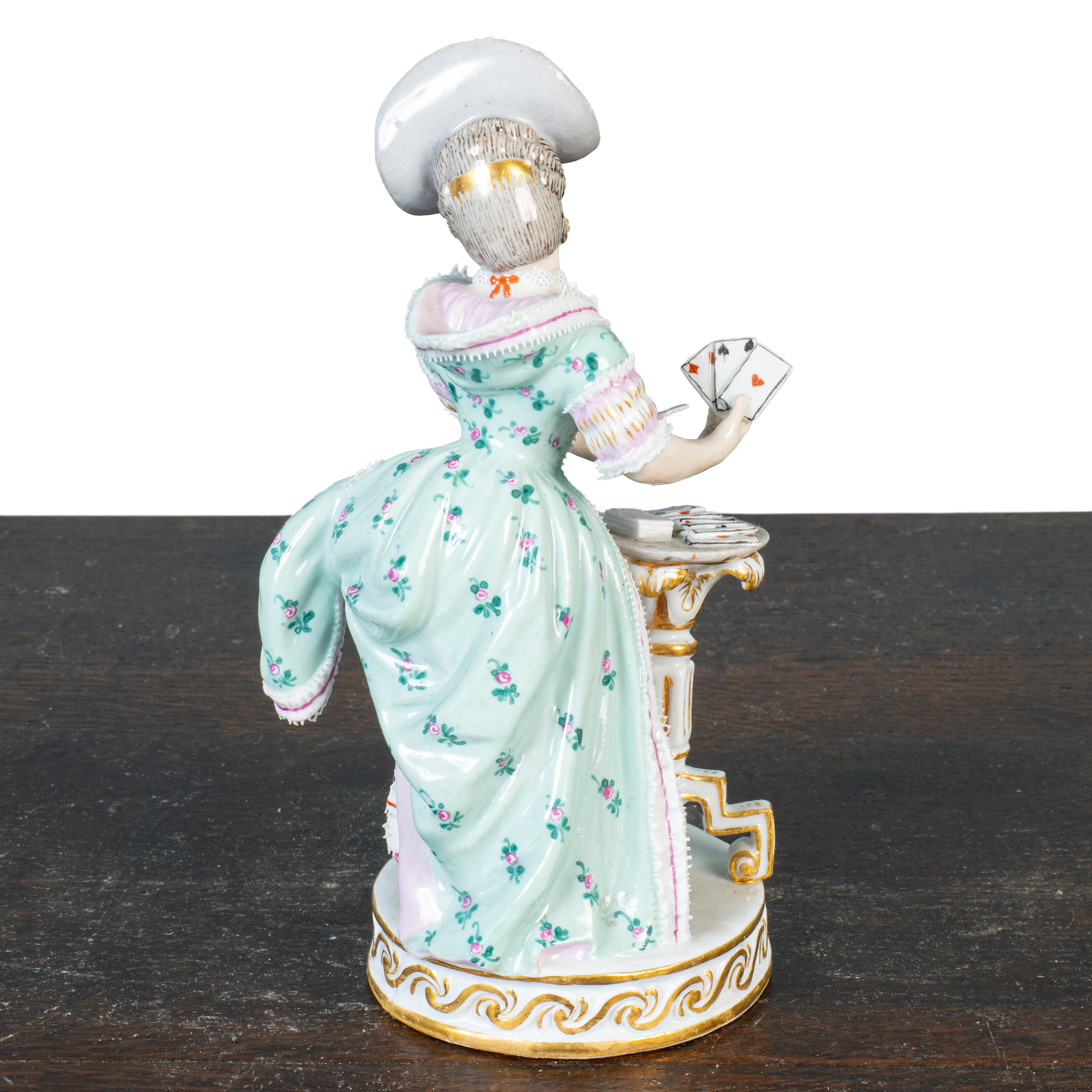 Meissen figure of a card player Meissen figure of a card player